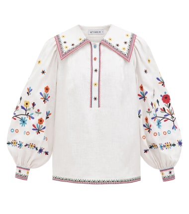Women's white long-sleeved blouse with embroidery